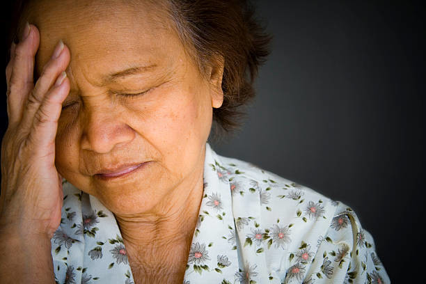 Elderly woman with headache